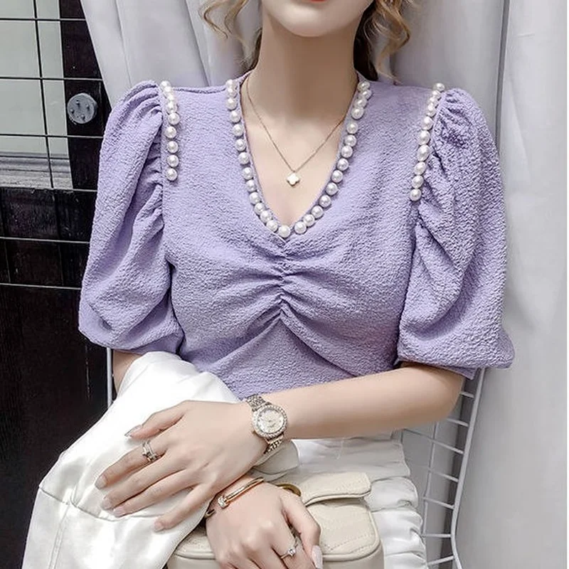 Vasaros korėjos versija 2021 naujų užsienio stiliaus perlas V-kaklo dizaino prasme yra plonas raukšlės burbulas trumparankoviai marškinėliai top moterims 2